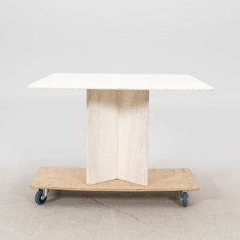 A polished travertine table from the second half of the 20th century.