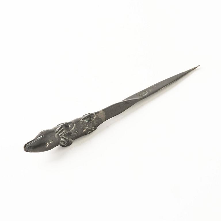 Firma Svenskt Tenn, a pewter hand mirror model A 1497 and a letter opener in the shape of an alligator, Stockholm, 1930s-40s.
