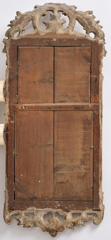 A Swedish Rococo mirror, 18 th century.
