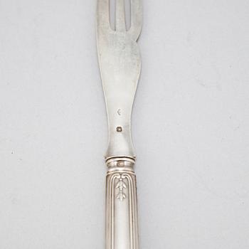 A set of twelve French 19th century silver lobster forks.