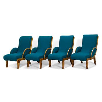 Four 1930s armchairs.