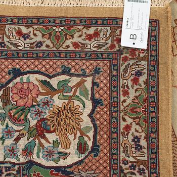 A carpet, old Tabriz part silk figural, ca 263,5 x 177 cm.