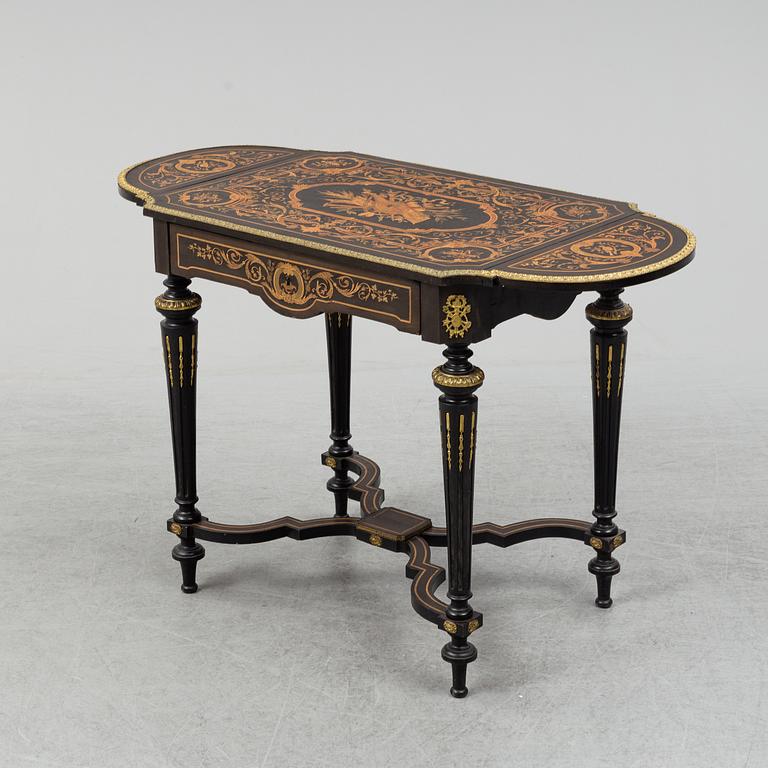 A Louis XVI-style table from the first half of the 20th century.