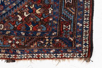 A Khamseh rug, antique, c. 192 x 155 cm.