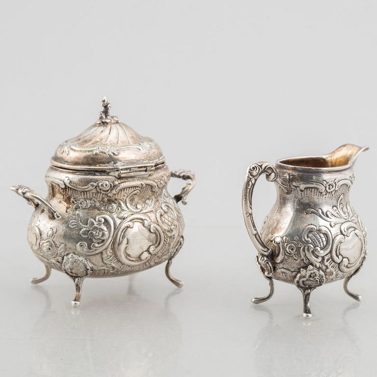 A Swedish silver sugarbowl, creamer and tray, mark of JL Hultman AB, Stockholm 1951-1952.