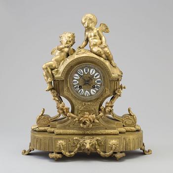 A late 19th century French brass mantle clock.