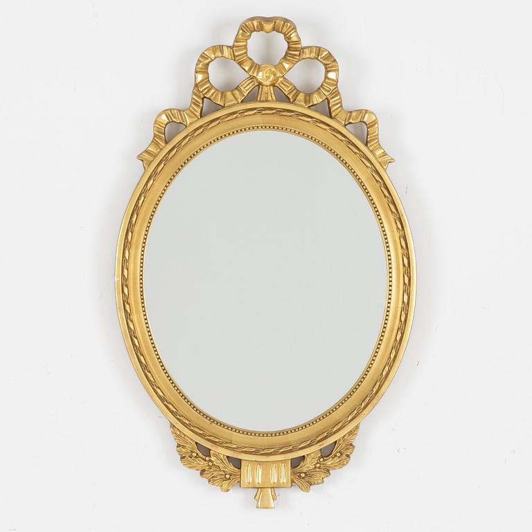 A Gustavian style mirror, mid 20th century.