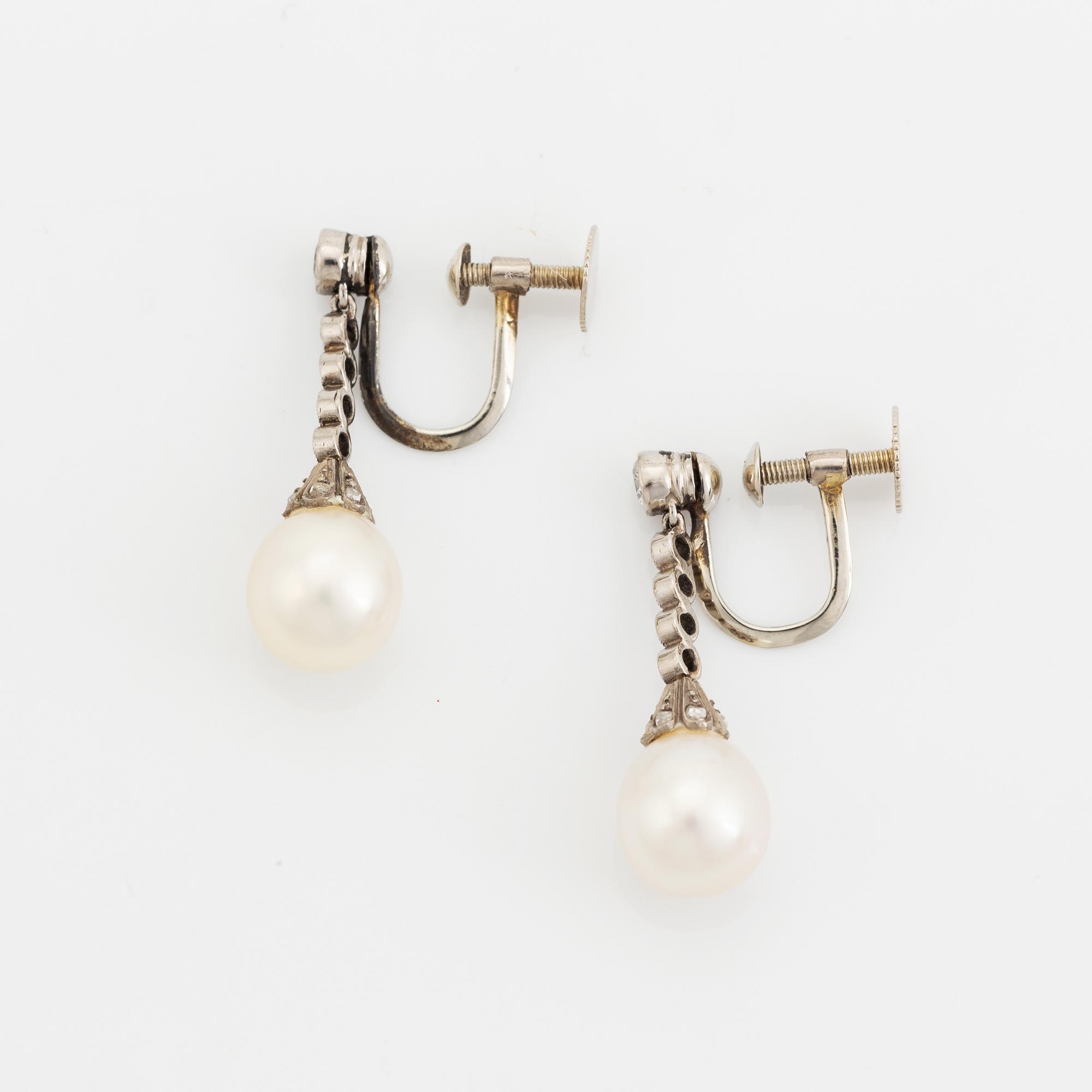 Old cut diamond and pearl earrings.