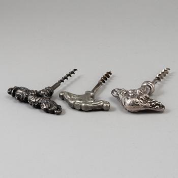 Three metal corkscrews, 1920/30.