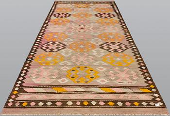 A kurdish kilim, ca 430 x 155 cm.