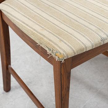 A 1960's/70's rosewood veneered dining group.