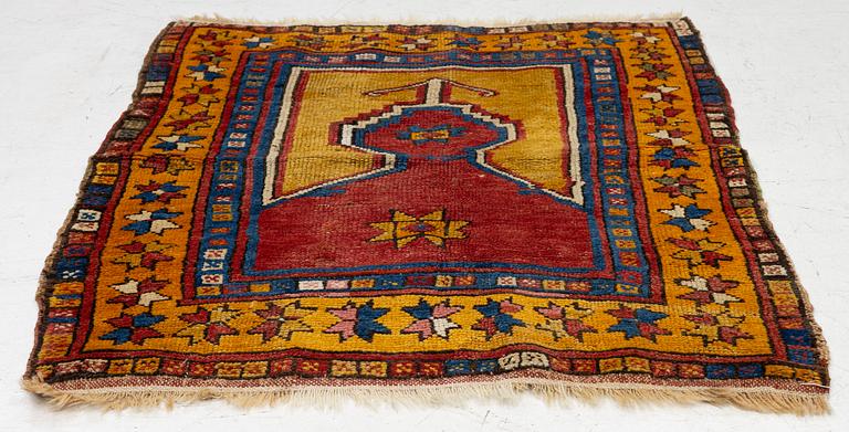 An antique prayer rug, central Anatolia, c.. 92 x 77 cm.