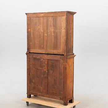 A mid 1800s mahogany book cabinet.