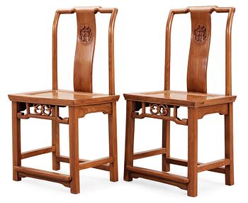 1823. A pair of wooden chairs, Qing dynasty.
