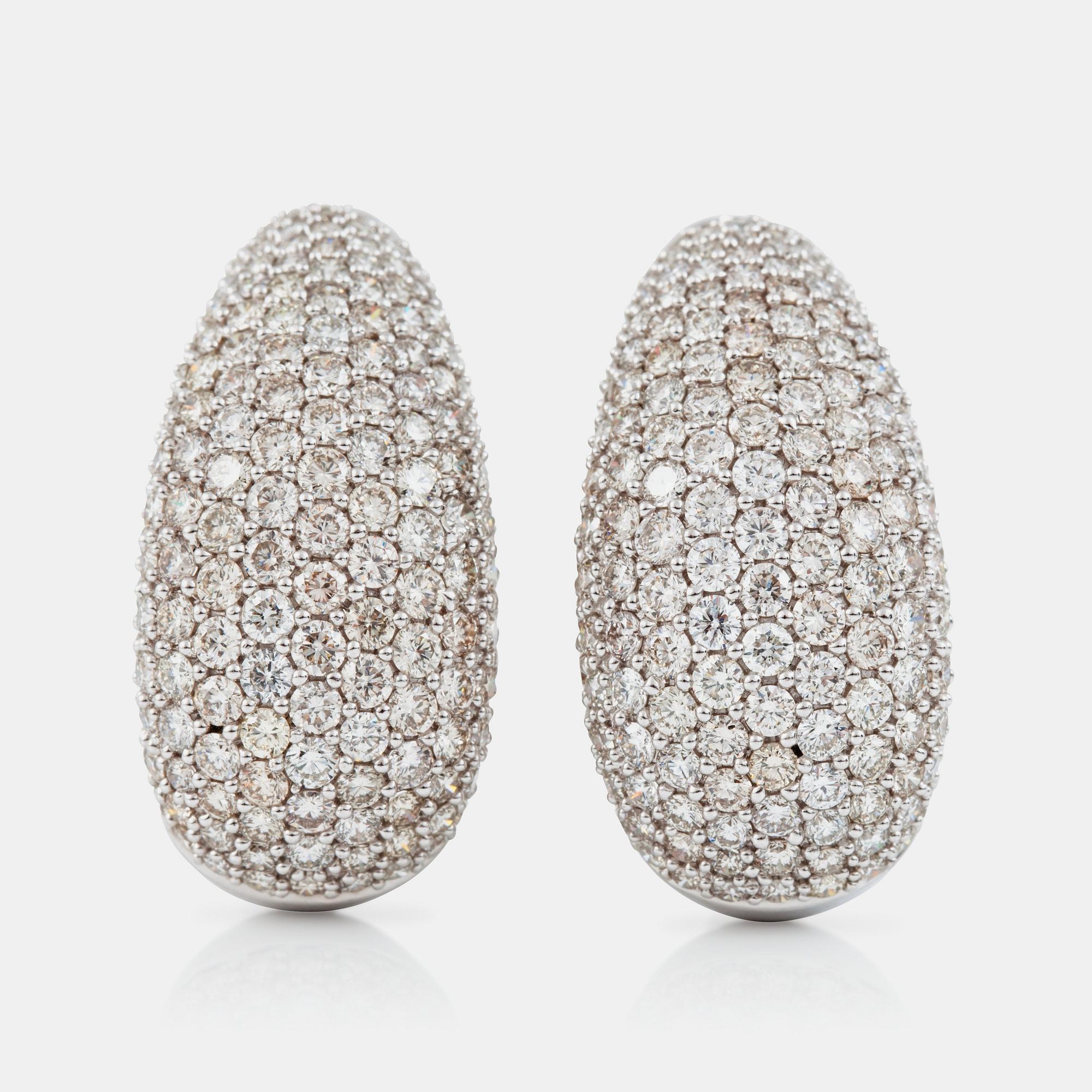 A pair of diamond earrings, 9.51 cts according to engraving.