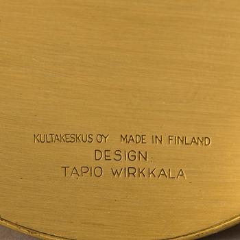 TAPIO WIRKKALA, A set of three brass candleholders, all marked Kultakeskus Oy Made in Finland, Design Tapio Wirkkala.