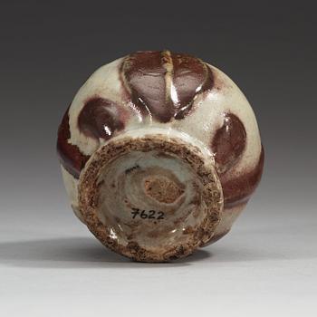 A peach shaped stone ware water sprinkler, Korea, 19th Century.