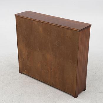 A bookcase, mid-20th Century.