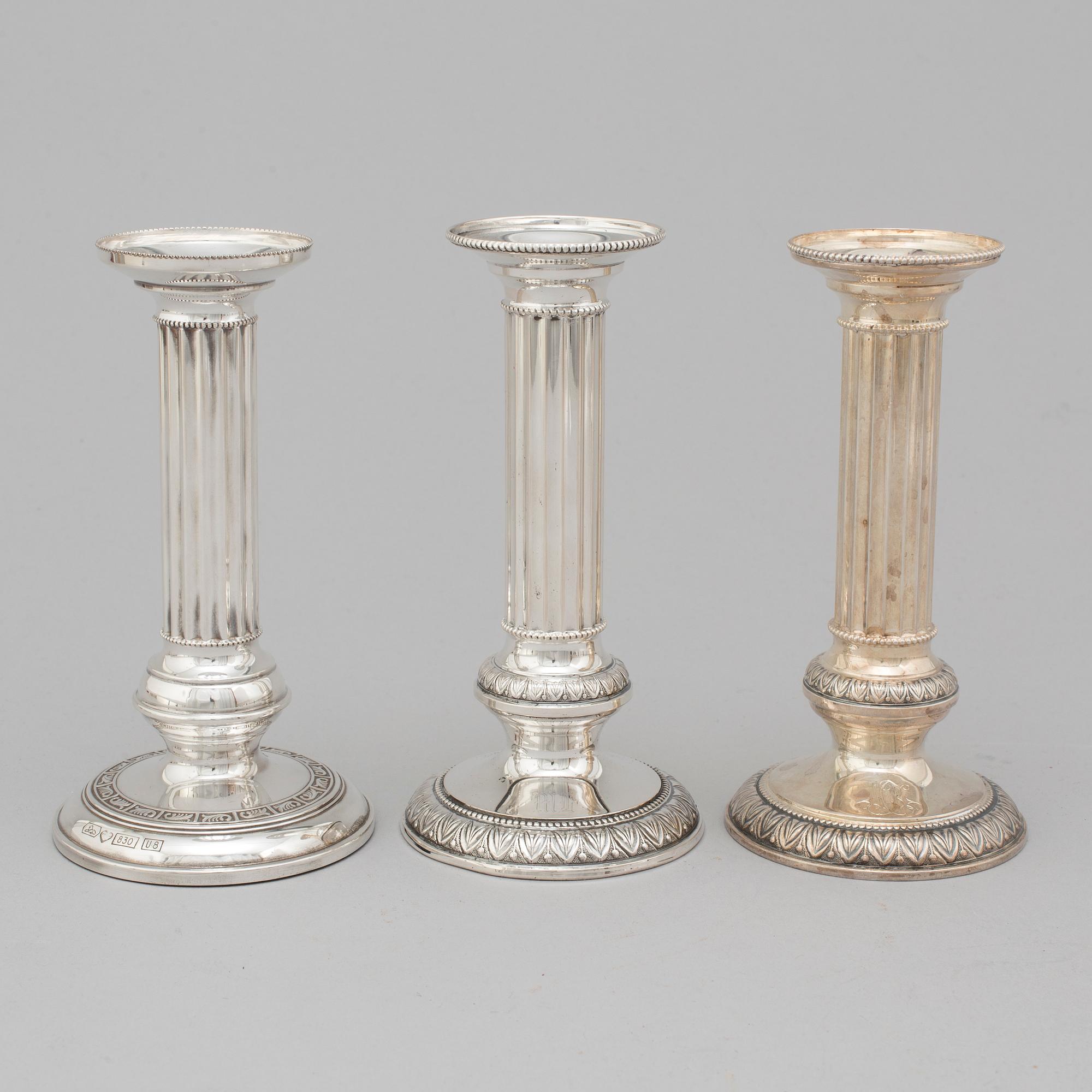 Three Finnish silver candlesticks, 1989-97.