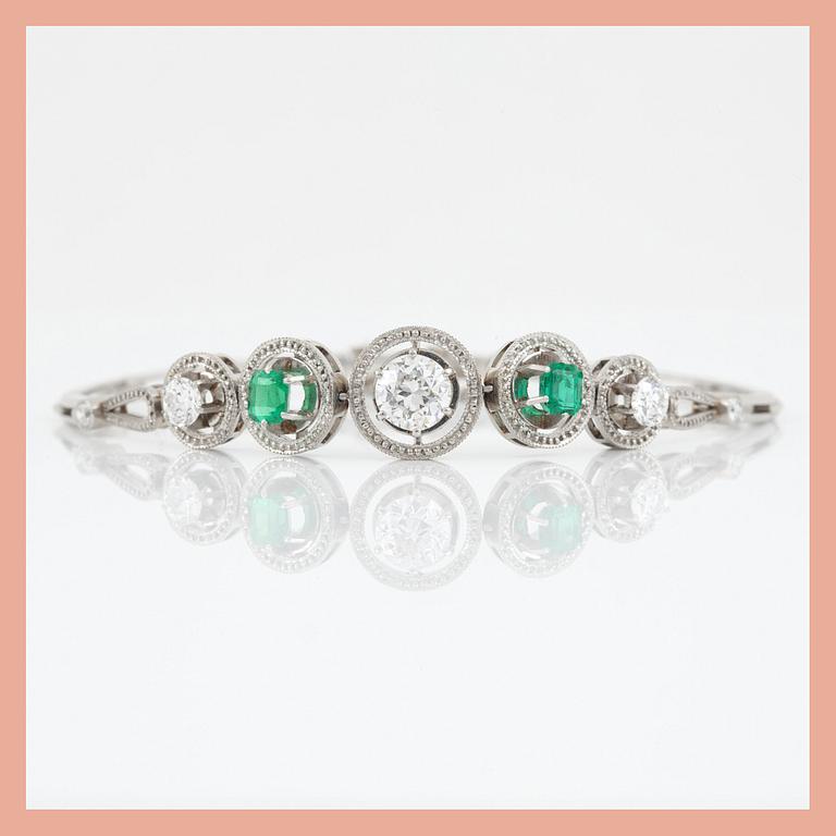 An emerald and old-cut diamond bracelet. Total carat weight of diamonds circa 1.50 cts.