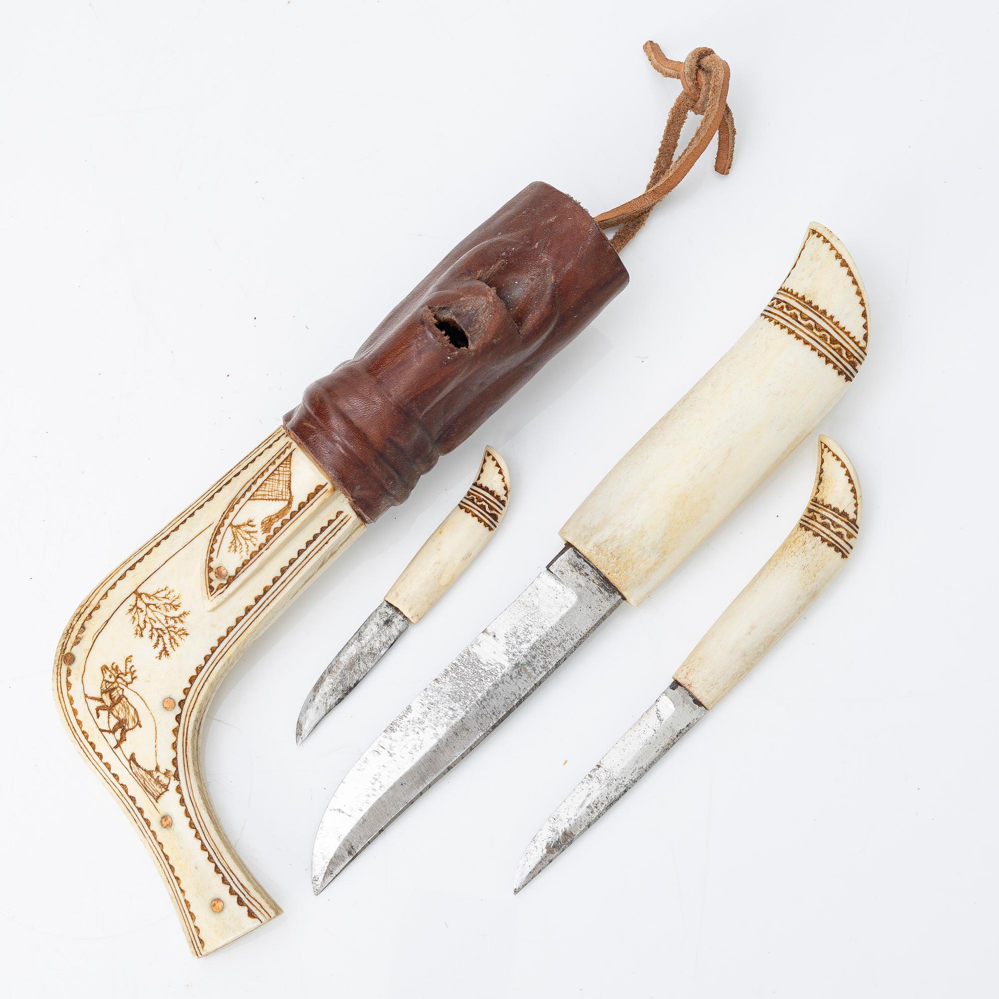 Half-horn knives, cup, bottle, needle case.