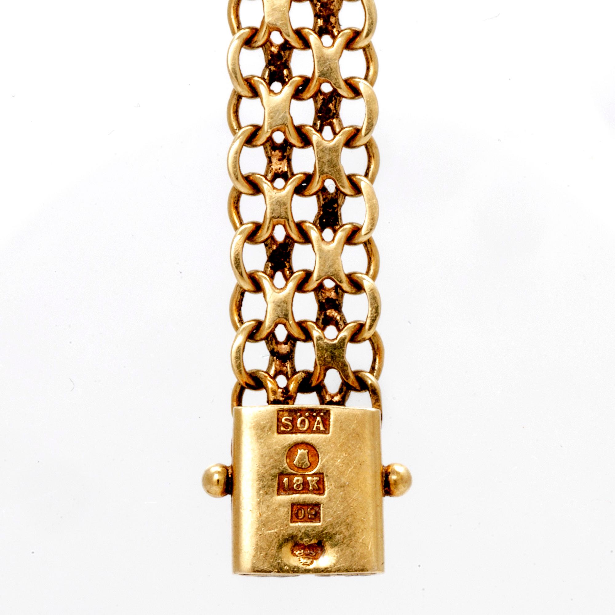 An 18K gold Favre-Leuba wristwatch.