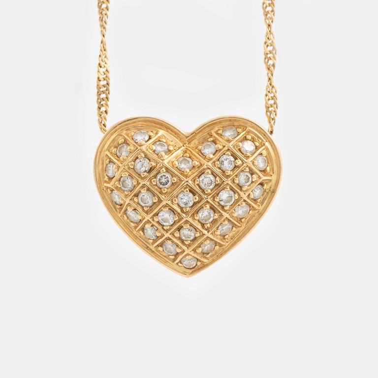 Heart shaped diamond necklace, 18K gold and diamonds.