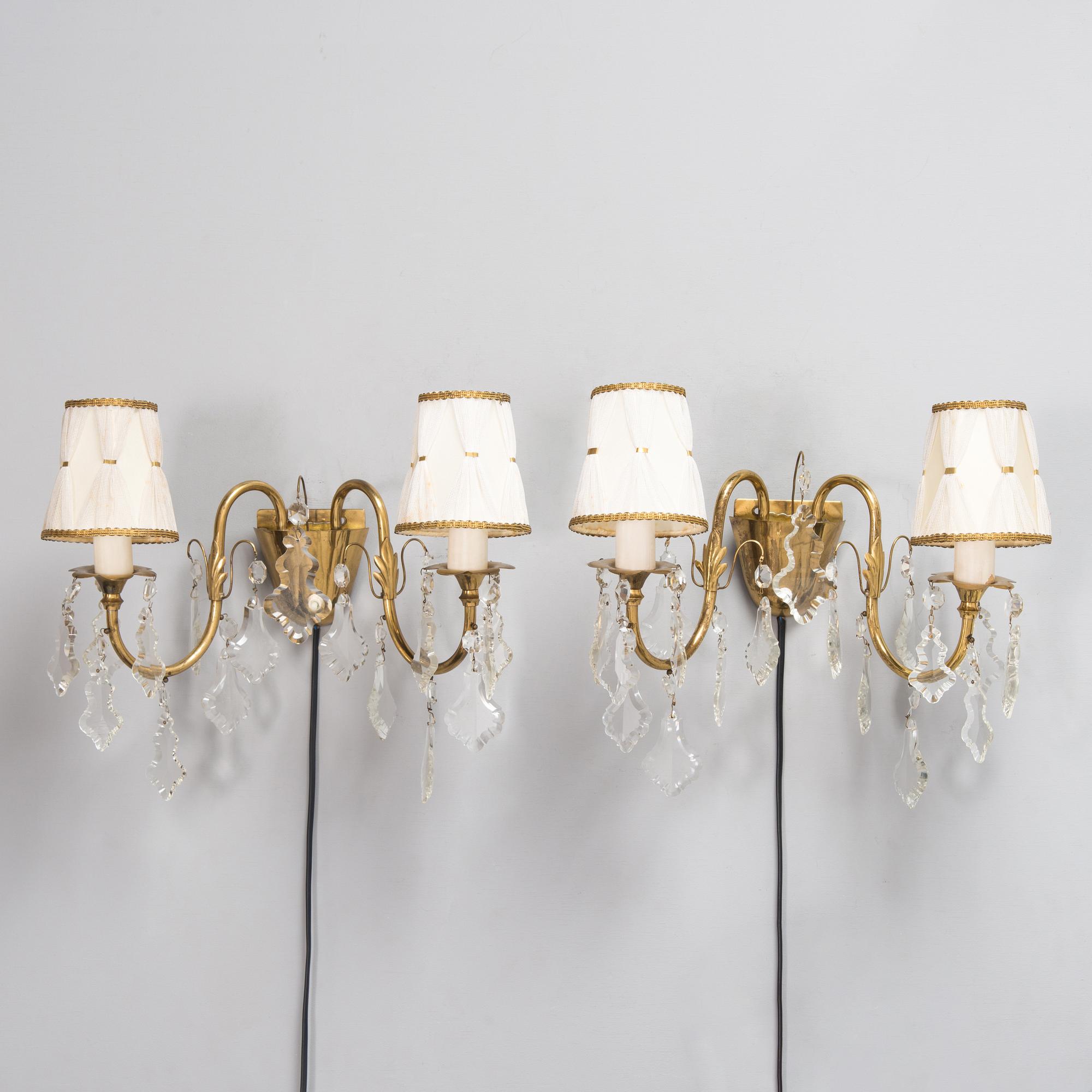 Mauri Almari, a pair of mid-20th-century brass wall sconces for Idman.