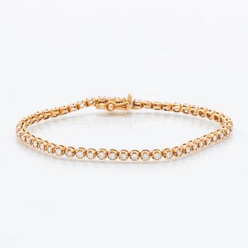 Tennisarmband 18K guld med runda briljantslipade diamanter totalt ca 1,56 ct.