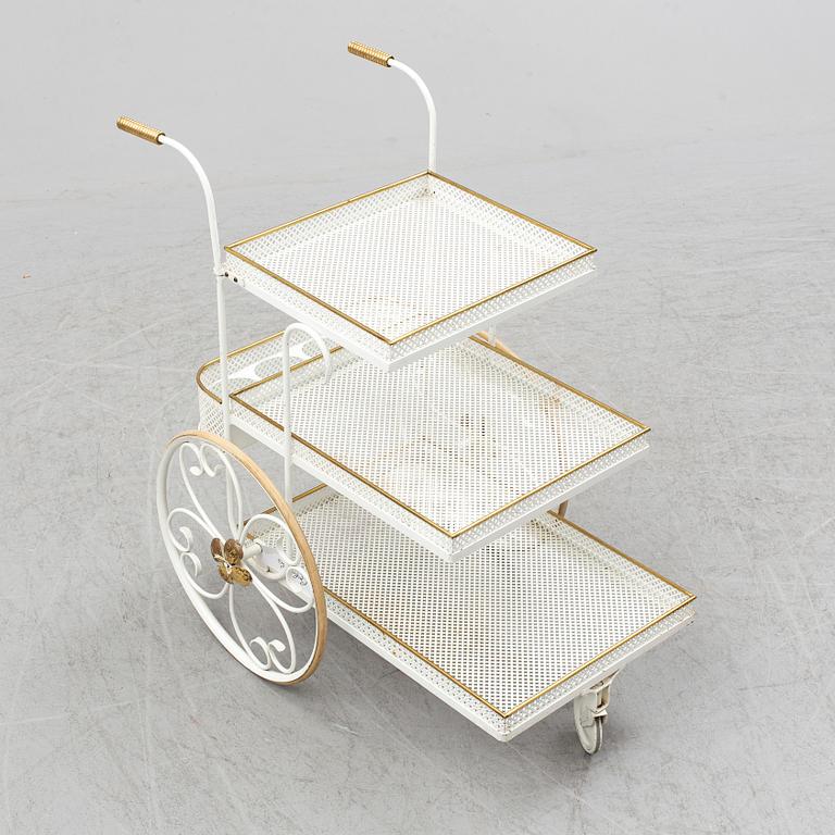 A white lacquered metal and brass serving trolley, 1940's-50's.