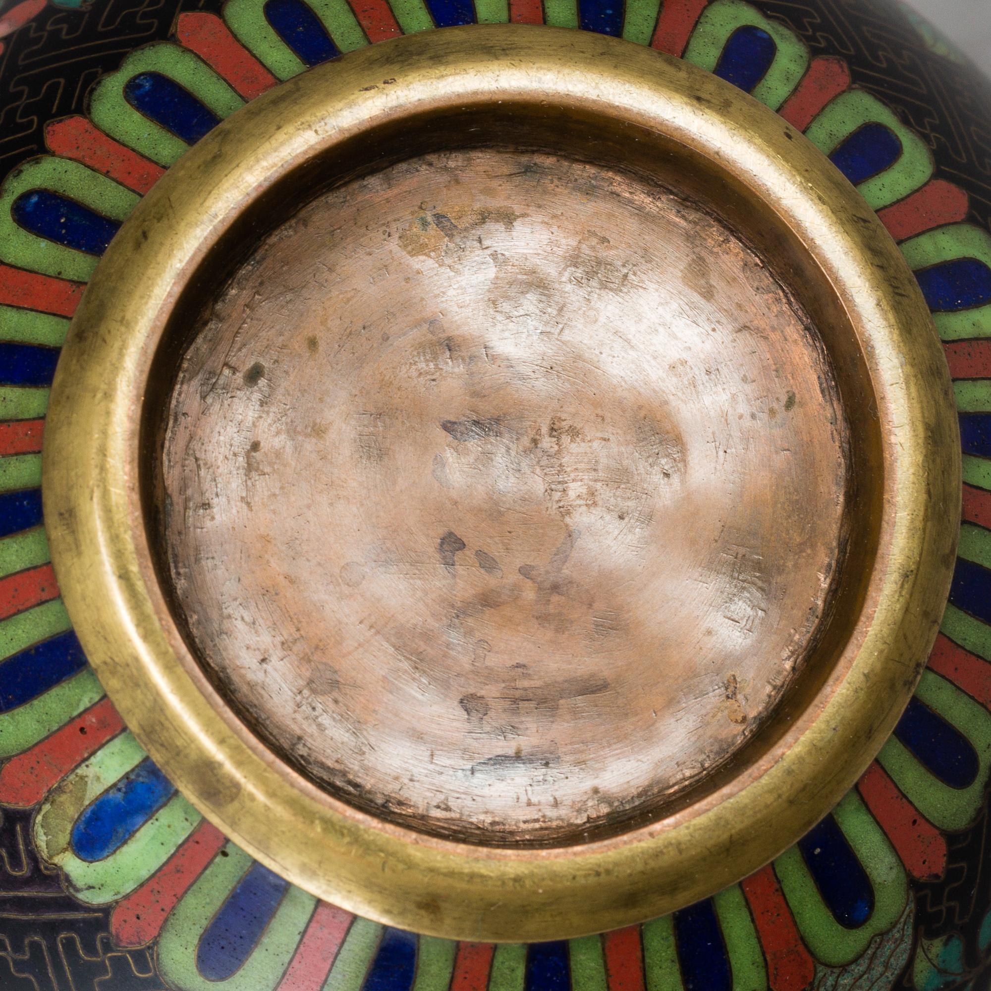 A group of three Chinese 
cloisonne vases and teapot with cover, 20th century.