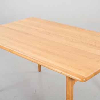 A SET OF 4 CHAIRS AND A TABLE BY Niels O Möller.