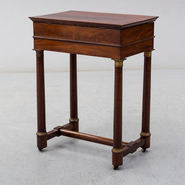 A mid 19th century sewing table.