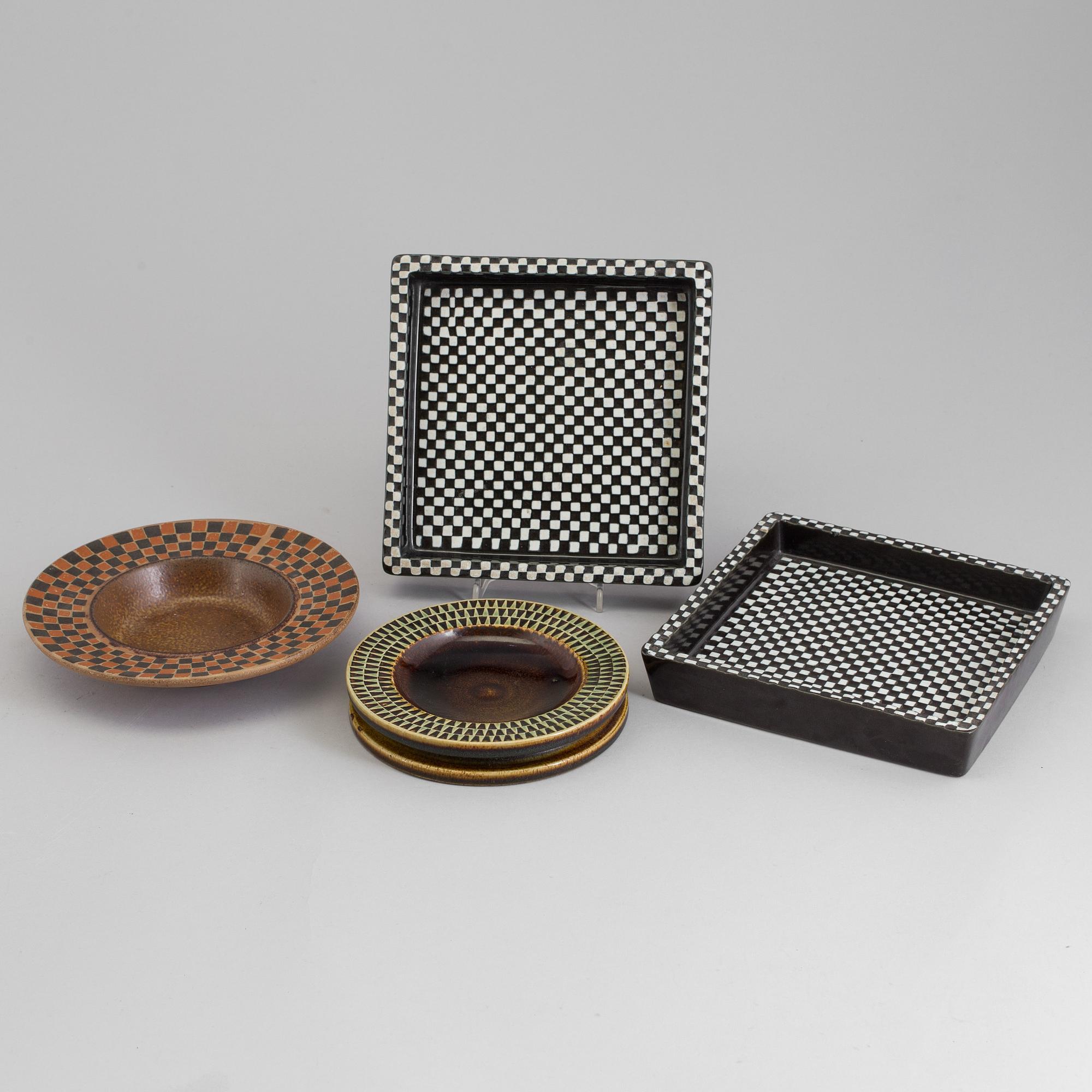 Four mid 20th century dishes by Stig Lindberg for Gustavsberg, two 'Domino', one 'Silur' and one signed.