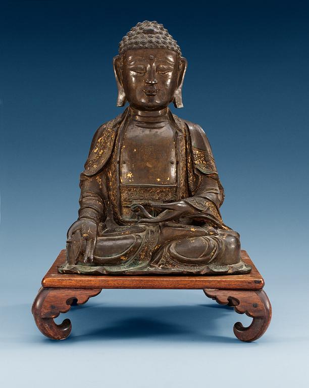 A bronze figure of Buddha, late Ming dynasty (1368-1644).