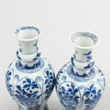 A set of two pairs of Kangxi and Kangxi style blue and white porcelain vases.