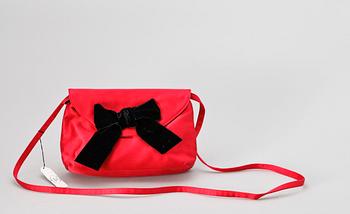 1477. A red silk shoulder bag by Prada.