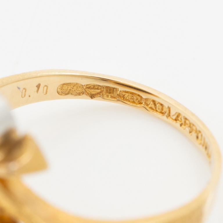 Lapponia, ring 18K gold with a blue stone likely of feldspar and a round brilliant-cut diamond, Finland 1978.