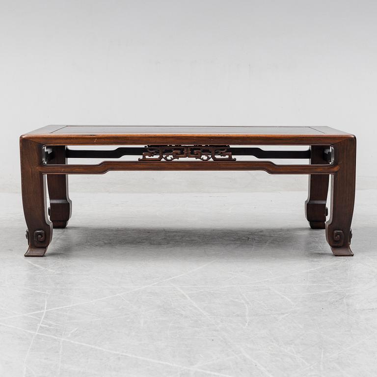 A Chinese hardwood low table, 20th Century.