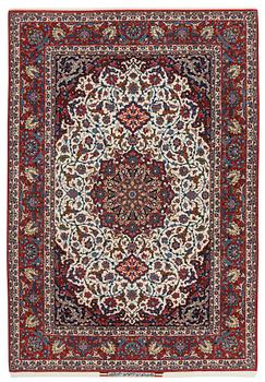 445. A CARPET. An old Esfahan. 243,5 x 166 cm (as well as a flat woven area at each end).