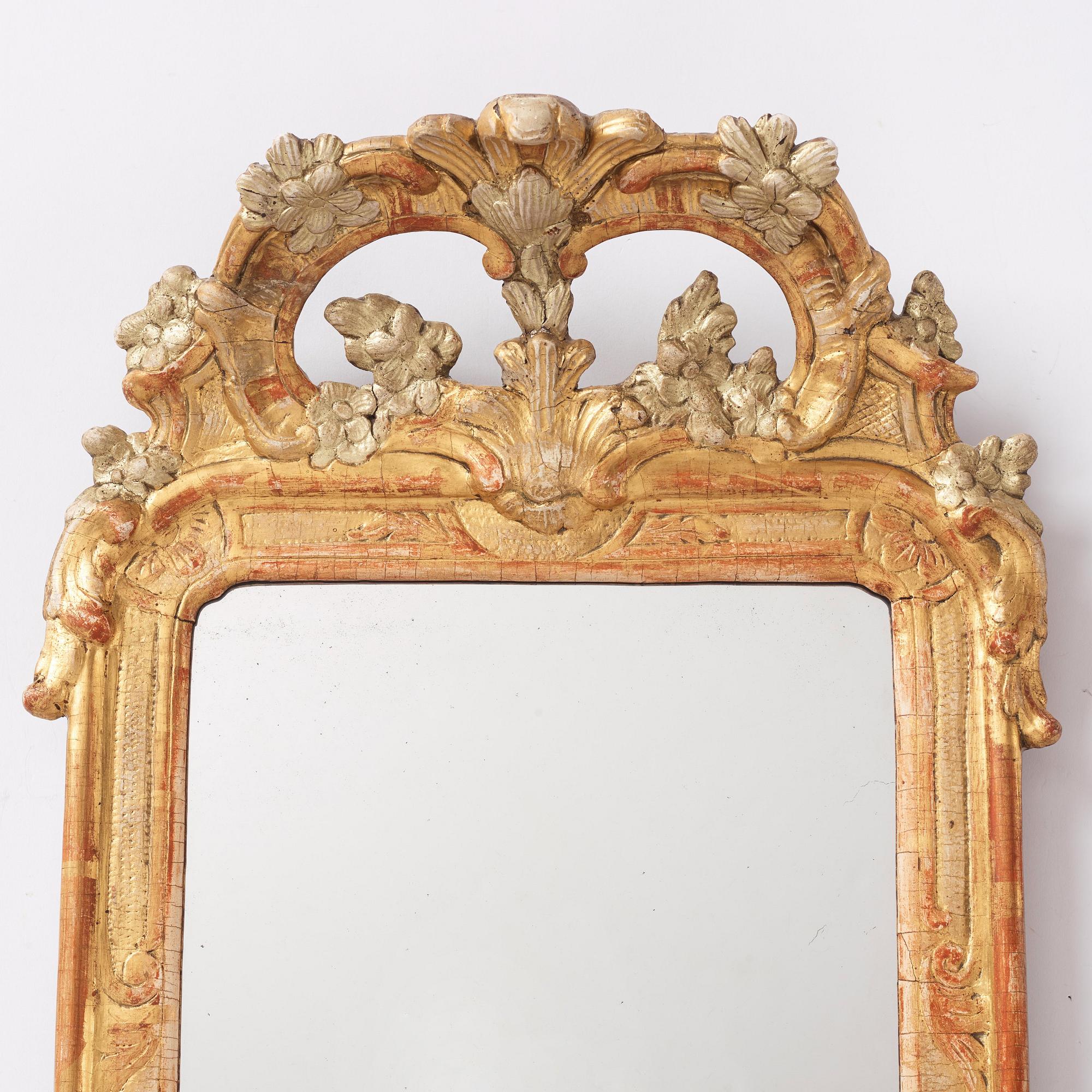 A Gustavian mirror by J Åkerblad (master in Stockholm 1758-1799), 1770s.