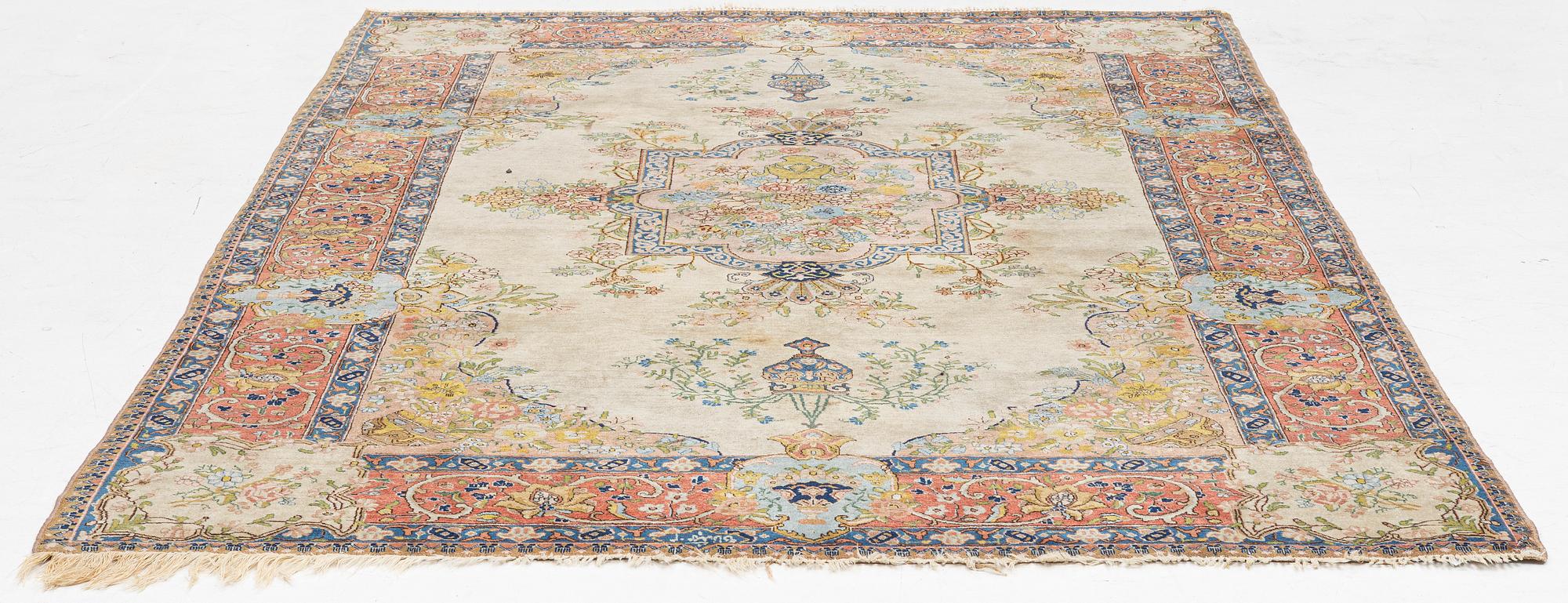 A semi-antique Tabriz carpet, West Persian, c. 250 x 175 cm.