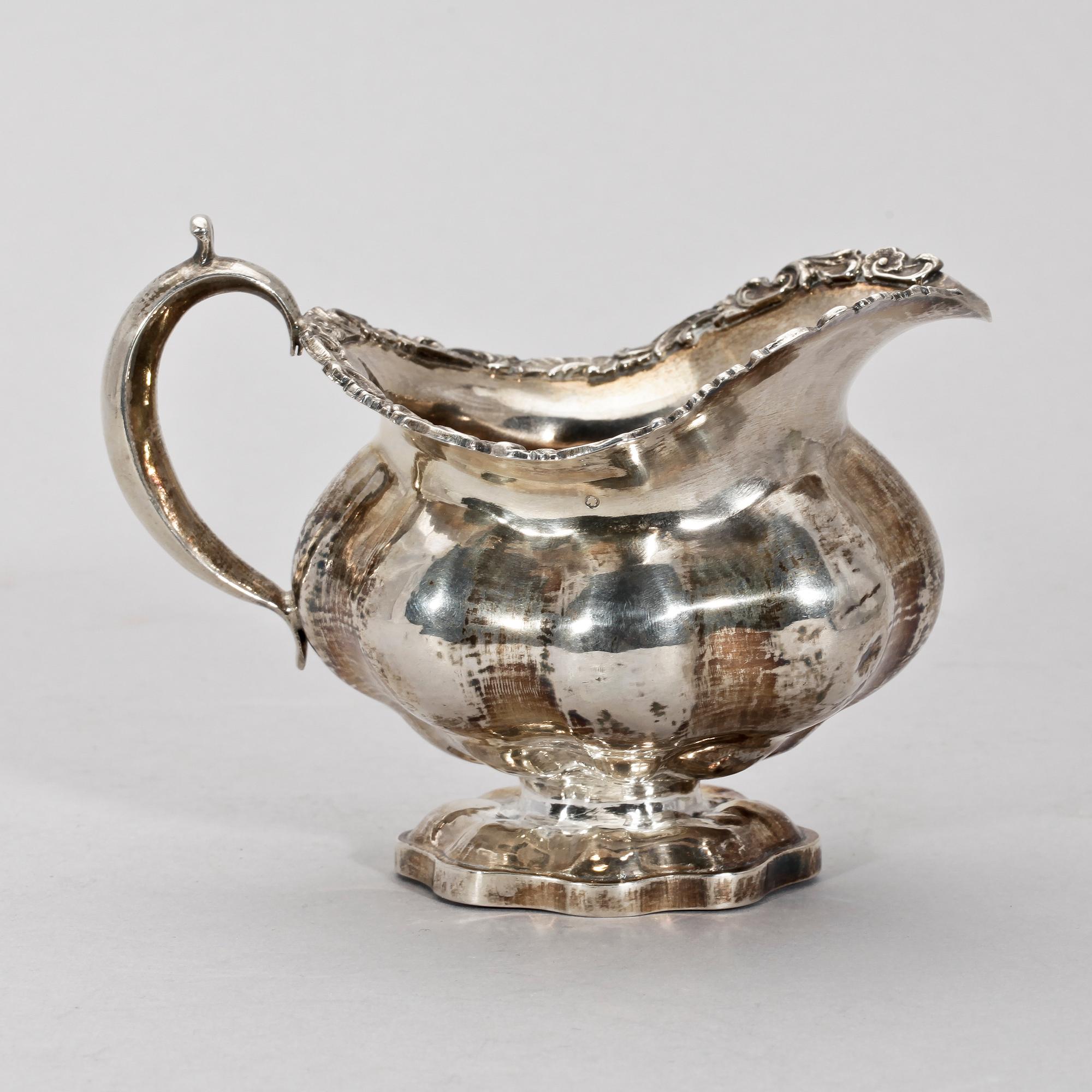 GRÄDDKANNA, silver, nyrokoko, St Petersburg 1856. Vikt ca 140 gram.