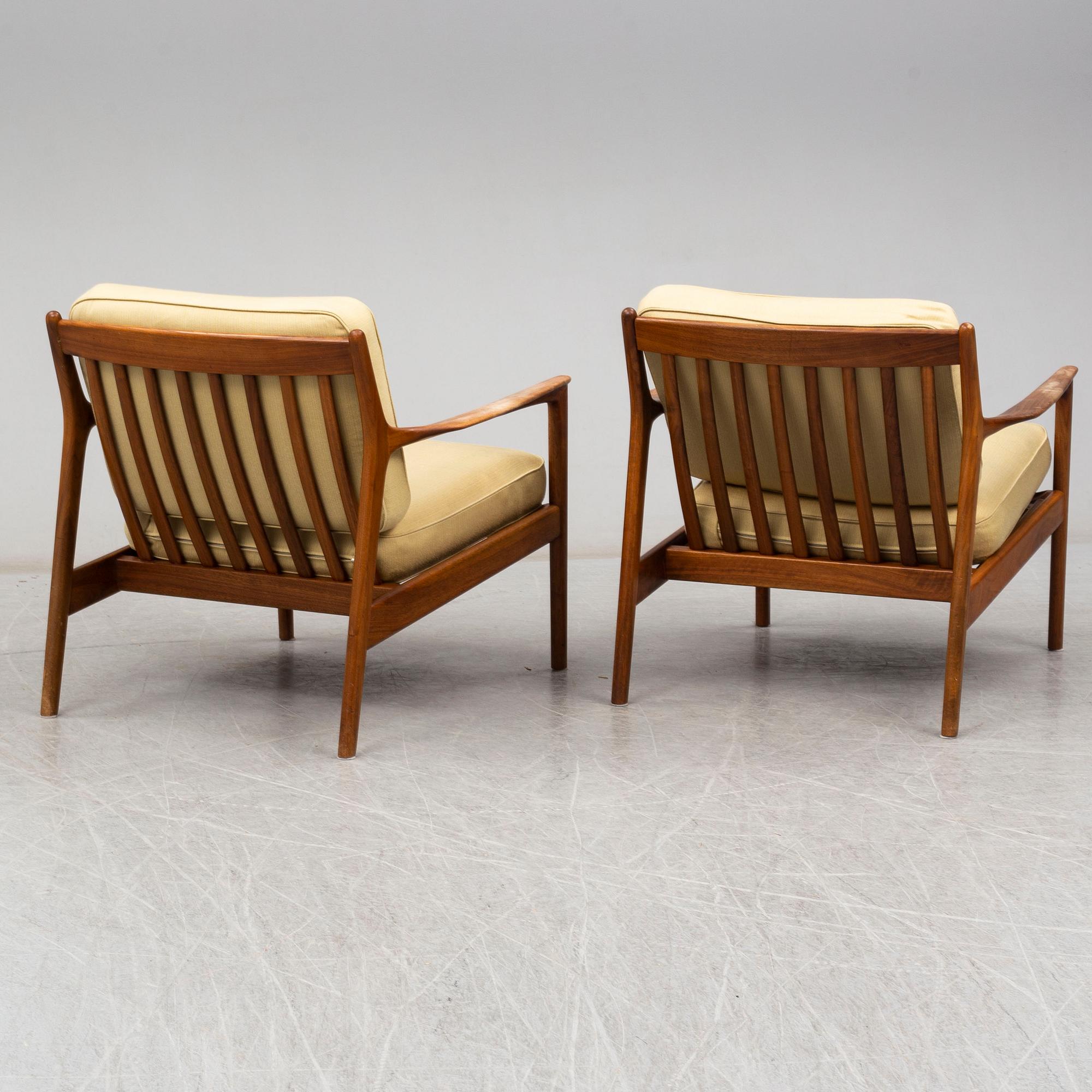 A pair of USA-75 easy chairs by Folke Ohlsson, DUX.