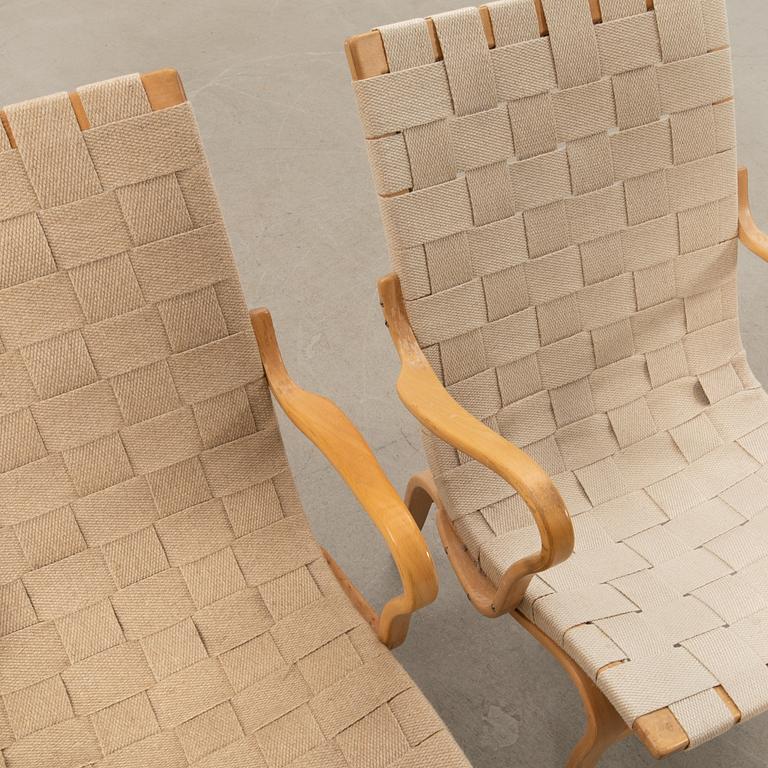 Bruno Mathsson, a pair of "Eva" armchairs, Bruno Mathsson Company, Värnamo, late 20th century.