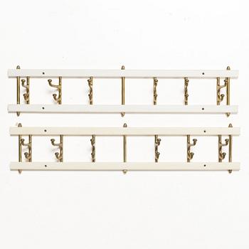 Coat hangers, a pair, “Dekorativ”, Skoglunds Metallgjuteri, Anderstorp, mid-20th century.