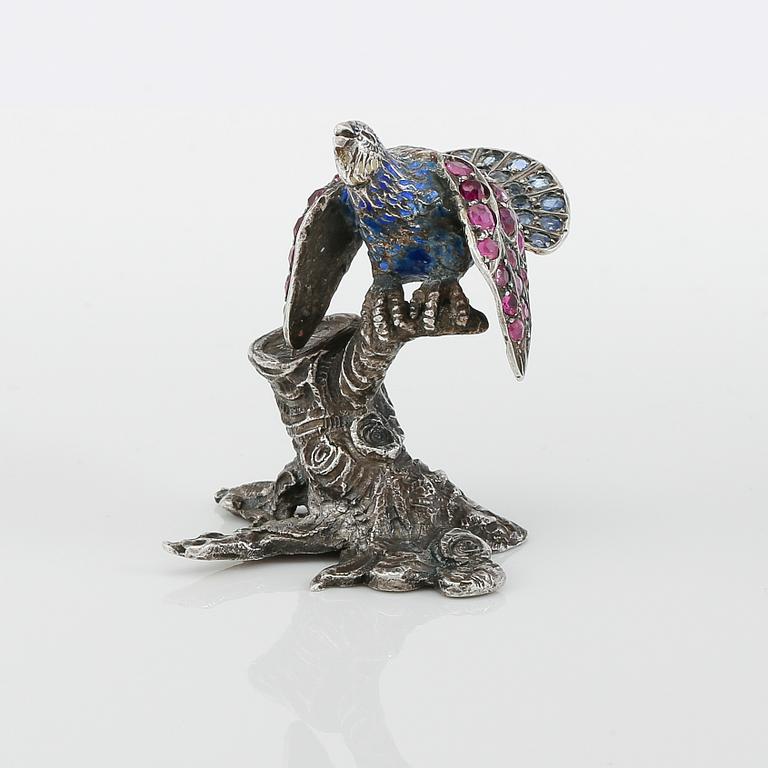 FIGUR, silver, emalj, rubiner och safirer, 1900-talets första hälft. Vikt ca 33 gram.