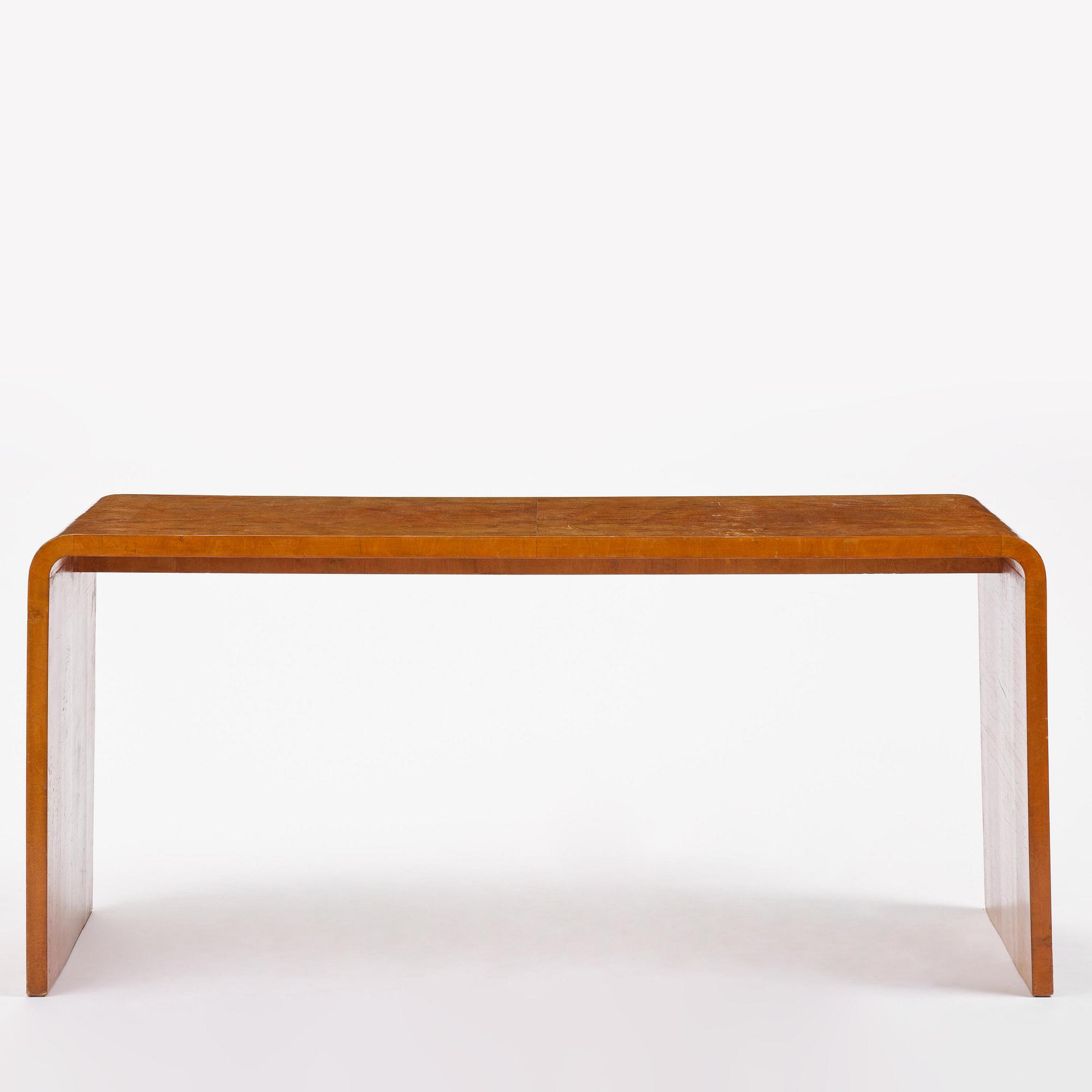 Swedish Modern, a birch veneered coffee table, 1930s-40s.