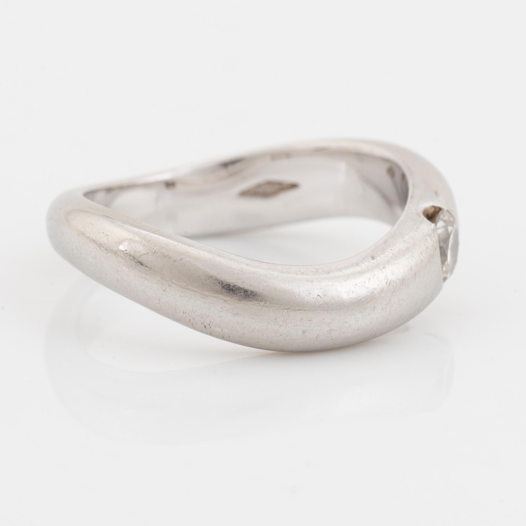 Platinum and brilliant cut diamond ring.