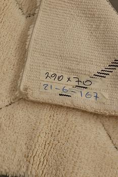 A Moroccan runner carpet, 290 x 70 cm.